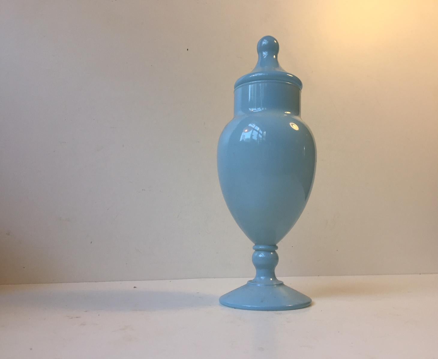 This light blue mouth blown urn or lidded vase was designed by Cenedese Vetri of Murano, Italy. It was designed and manufactured during the mid-late 1960s.