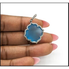 Baby Blue Topaz & Diamond Pendant in 14K White Gold