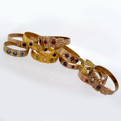 "Baby Boom" Necklace with Eleven Gold Antique American Baby Rings on Black Chain