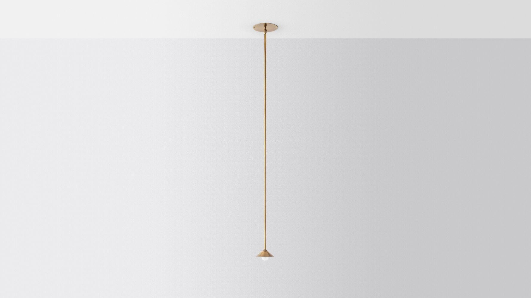 Baby drop by Volker Haug
Pyramid scheme series
Dimensions: W 15, D 15, H 40 cm
Small pendant: ø 10 cm
Support: ø 15 cm
Suspension: Min 40 cm

Material: Brass
Finishes: Polished, brushed or bronzed brass, enamel or chrome-plated.
Custom
