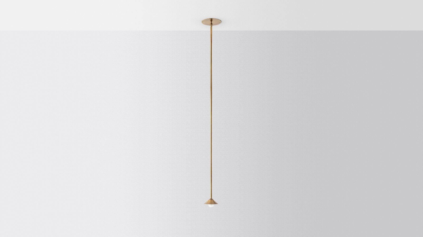 Baby drop by Volker Haug
Pyramid scheme series
Dimensions: W 15, D 15, H 40 cm
Small pendant: ø 10 cm
Support: ø 15 cm
Suspension: Min 40 cm

Material: Brass
Finishes: Polished, brushed or bronzed brass, enamel or chrome-plated.
Custom