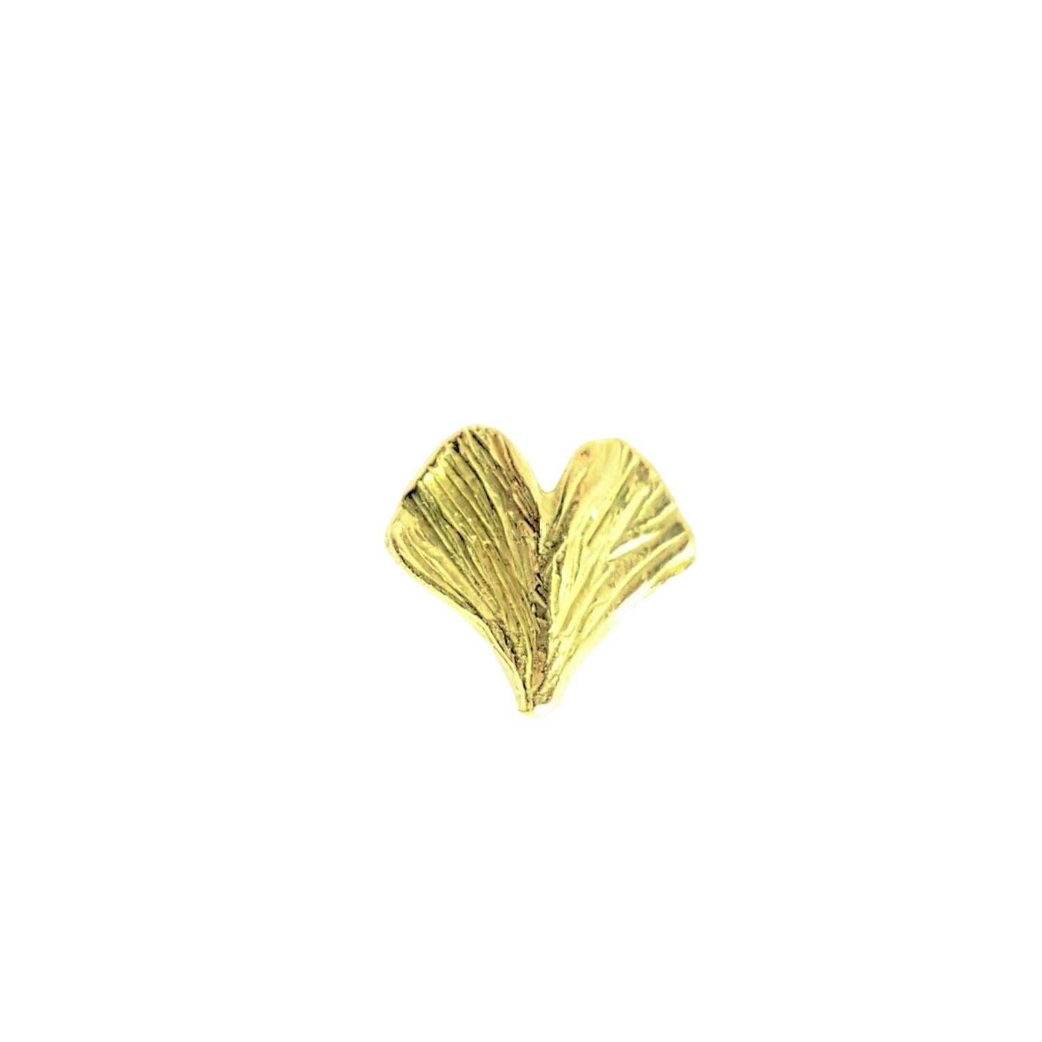 Alison Nagasue jewelry designs began with her branded Gingko leaves. Although she usually designs larger pieces of jewelry in 18K gold, these stud earrings were needed by her customers with multiple piercings. Yellow green gold is Alison's go to