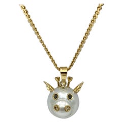 Collier pendentif Baby Giraffe en or 18 carats avec perles d'Australie noires et brunes