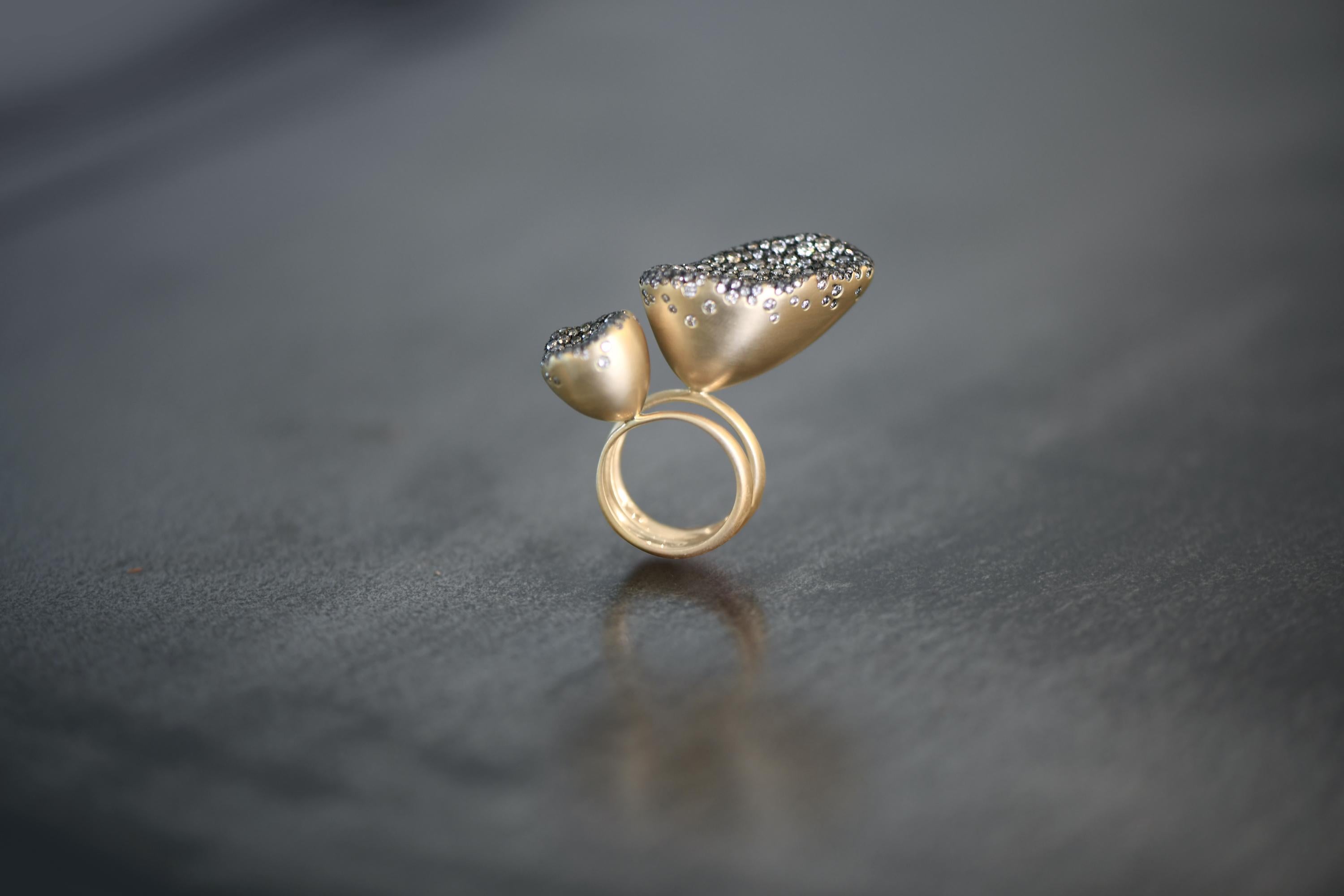 This 'Baby Malak' Flourish Medium Marquise Ring is handcrafted in 18k Gold with 3CT of Champagne Diamonds. 
It can be created in black or ice white diamond and without Rhodium.
'Baby Malak' Flourish was created at a time of turmoil in Beirut. The
