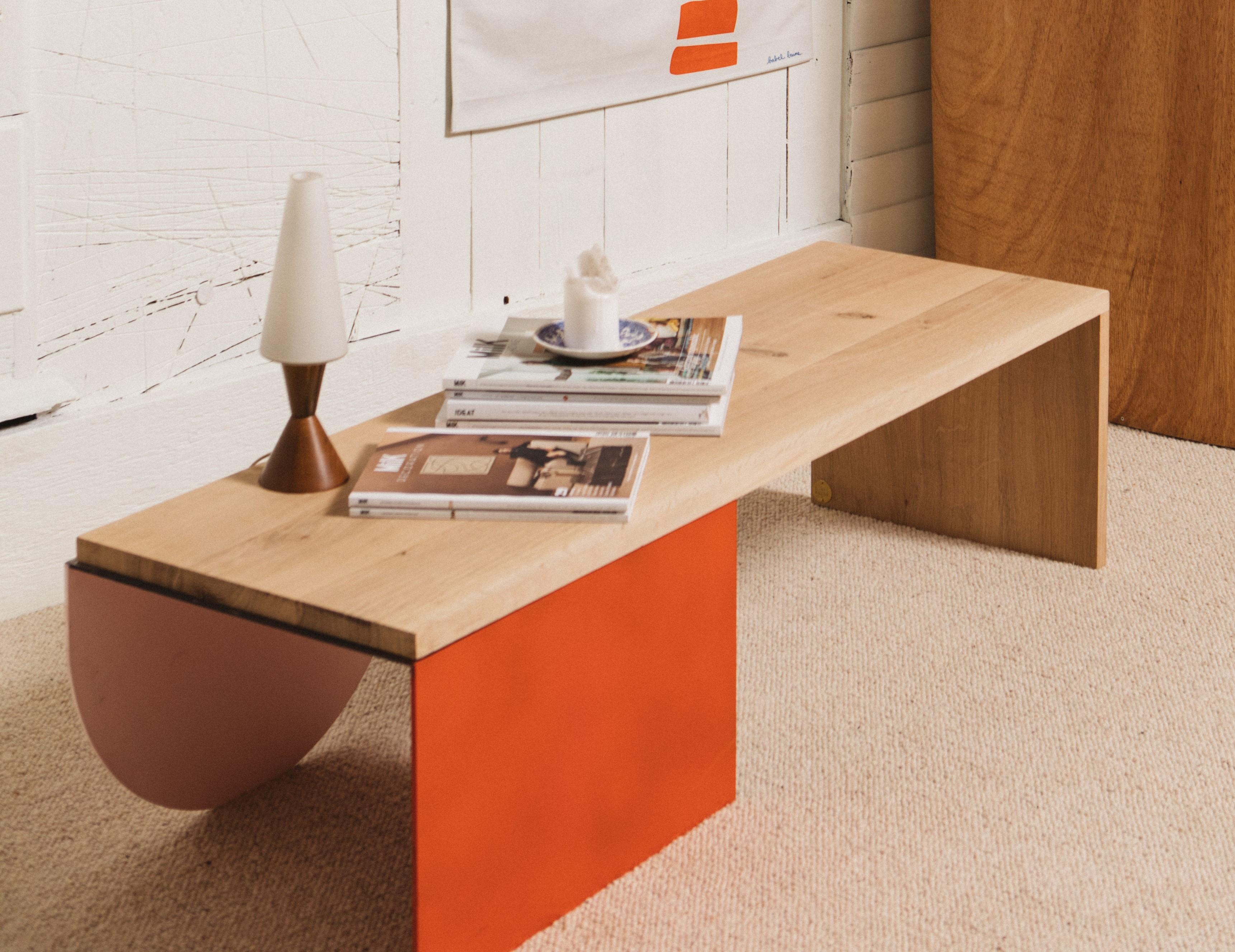 Babylone pink babel one coffee table by Babel Brune
Dimensions: D 42 x W 130 x H 35 cm
Material: Solid blond oak wood, oil finish, pink and red Powder-coated Steel

Little sister, of the Babylone Blue coffee table, this coffee table marries the