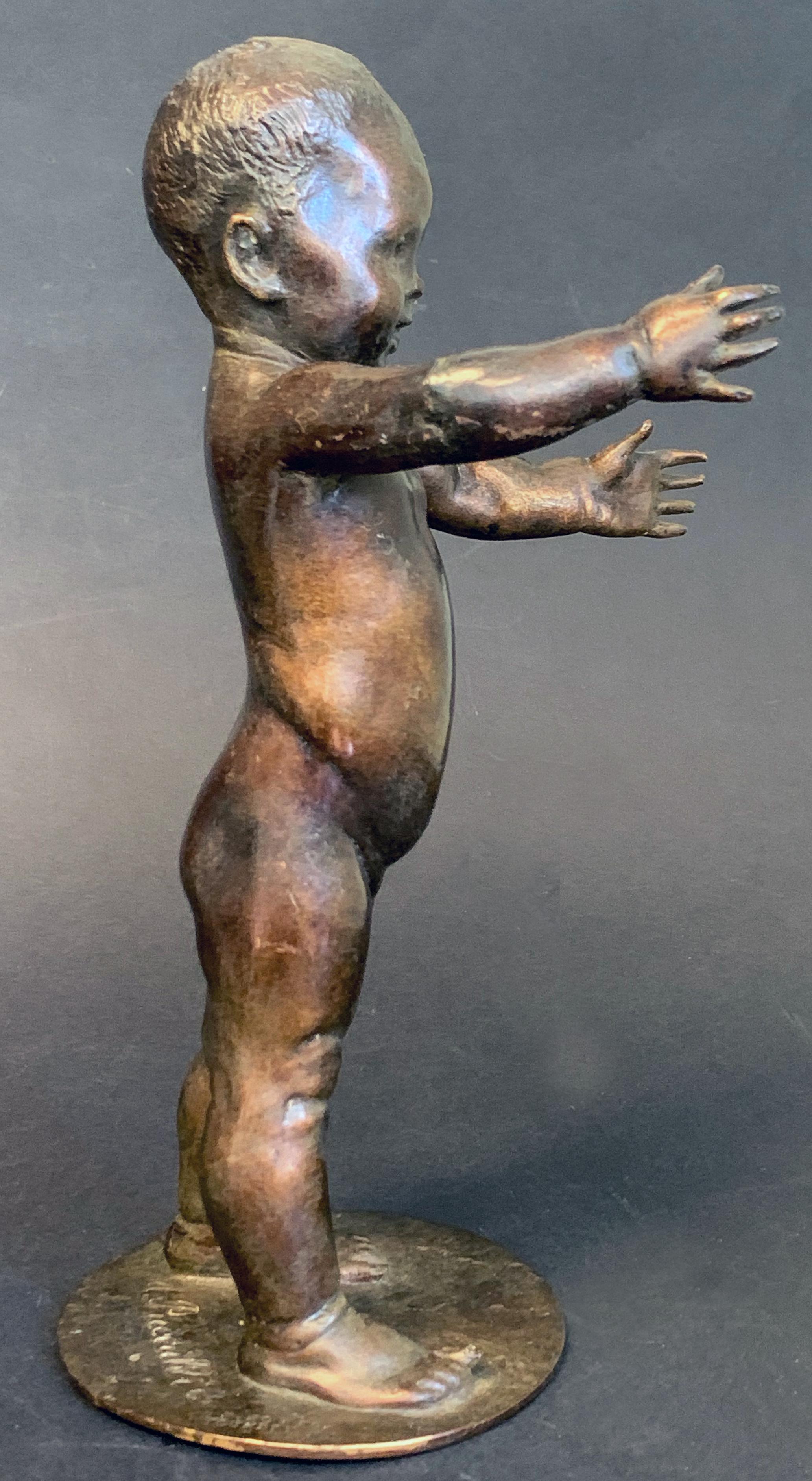 Fully charming and joyous, the moment when a baby takes its first step -- always a celebratory moment for parents -- is captured in this rare bronze by Attilio Piccirilli. It was sculpted in 1917, two years before Fiorello LaGuardia (later Mayor of