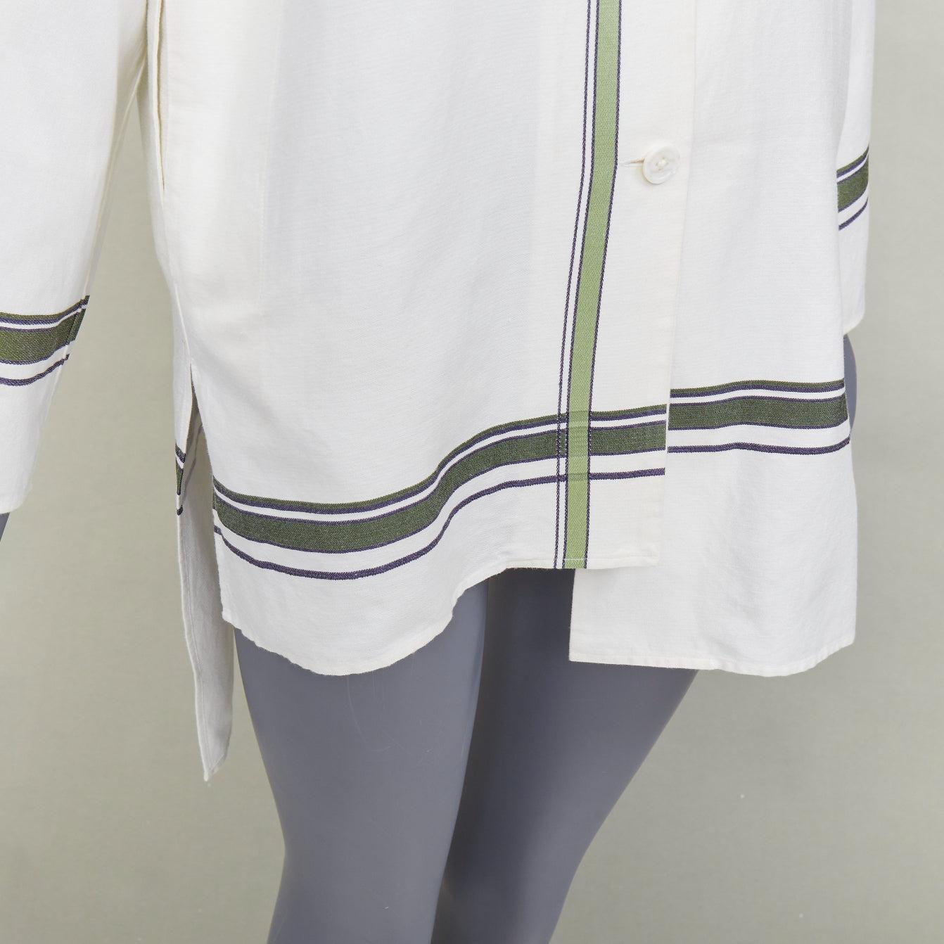 BACCA - Maglia oversize a righe asimmetriche in cotone misto seta verde panna IT36 S
Riferimento: JACG/A00285
Marchio: Bacca
Materiale: Cotone, misto
Colore: Crema, Verde
Modello: A righe
Chiusura: bottone
Prodotto in: