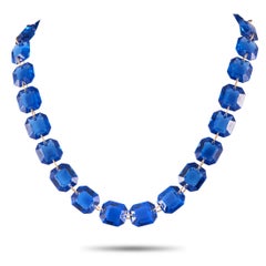Parure di collana e orecchini con cristalli blu in oro giallo 18 carati di Baccarat
