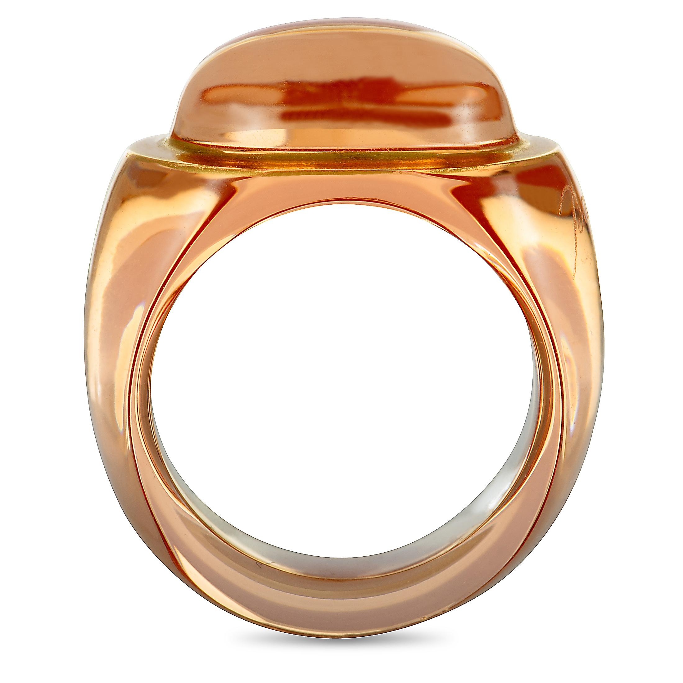 This Baccarat ring is made out of 18K yellow gold and crystal and weighs 6.2 grams. It boasts band thickness of 5 mm and top height of 7 mm, while top dimensions measure 17 by 13 mm.

Offered in estate condition, this jewelry piece includes a gift