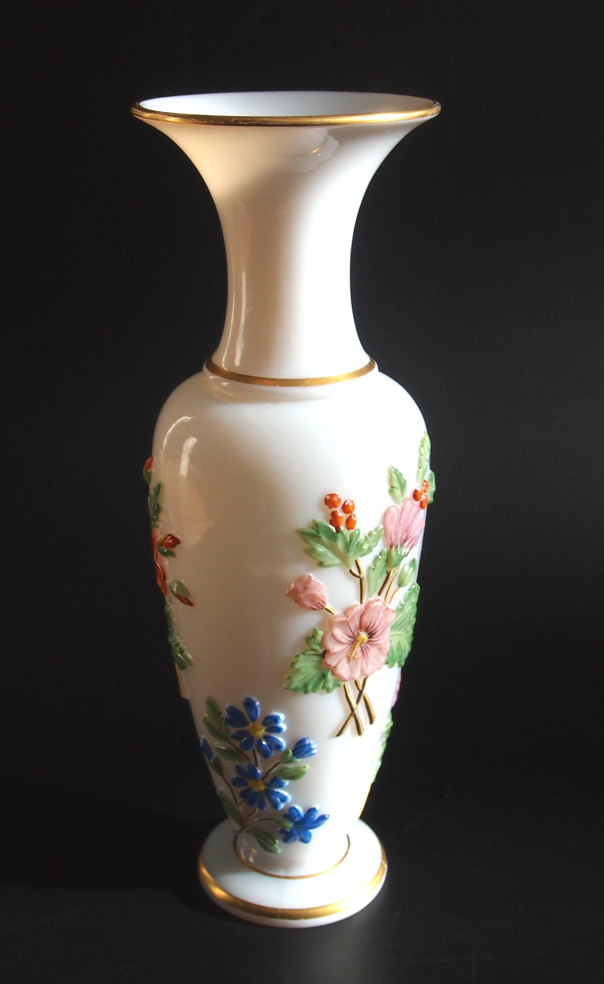 Amazing mid-19th century opaline enamelled and gilded Baccarat vase -polychrome enamelled over fine raised flowers. Vases like these were first displayed at the great Paris exhibition of 1855.


Baccarat is and has been the creator of finest
