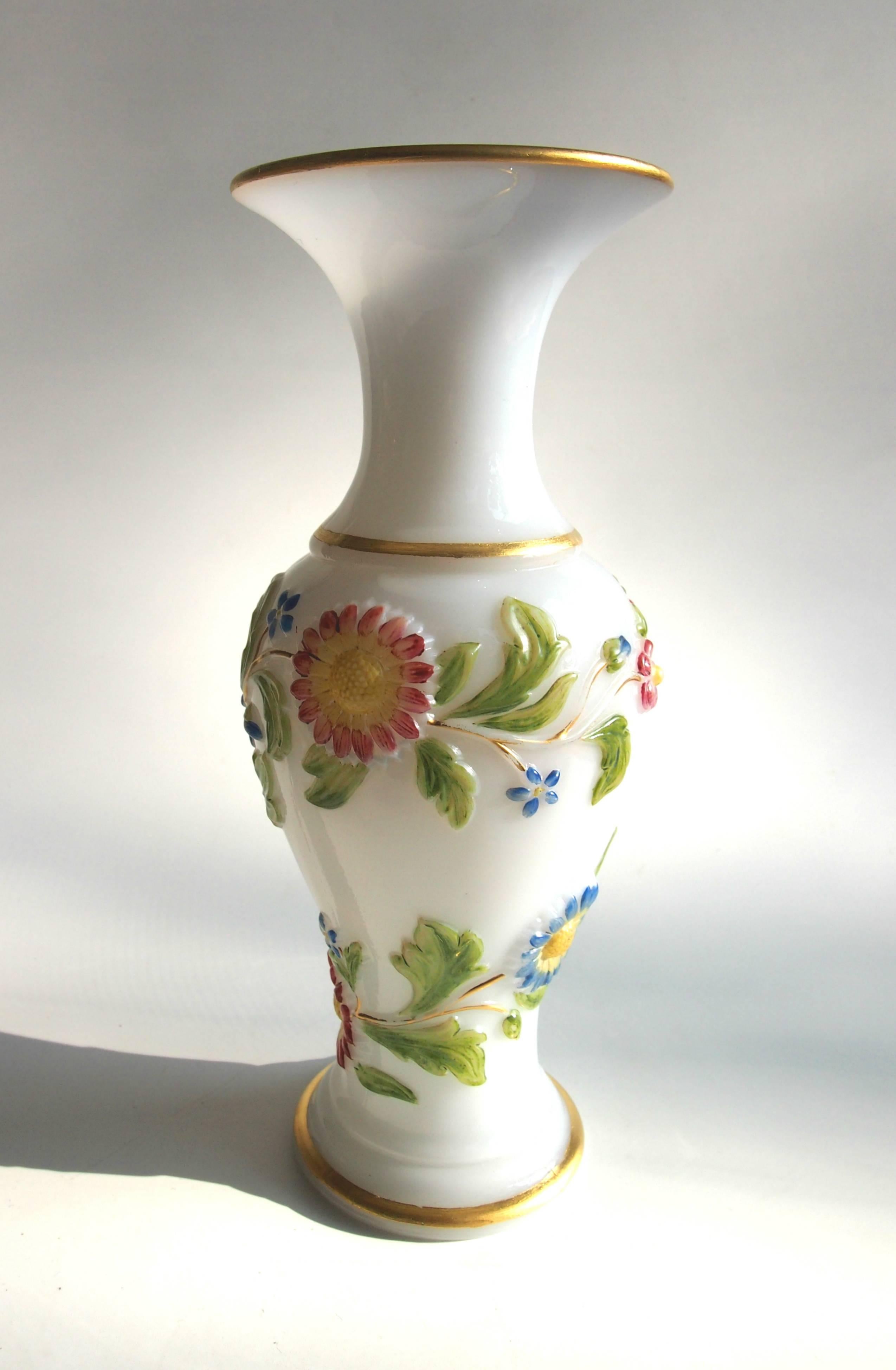 Amazing mid-19th century opaline enamelled and gilded Baccarat vase polychrome enamelled over fine raised daisies. Vases like these were first displayed at the great Paris exhibition of 1855.


Baccarat is and has been the creator of the finest