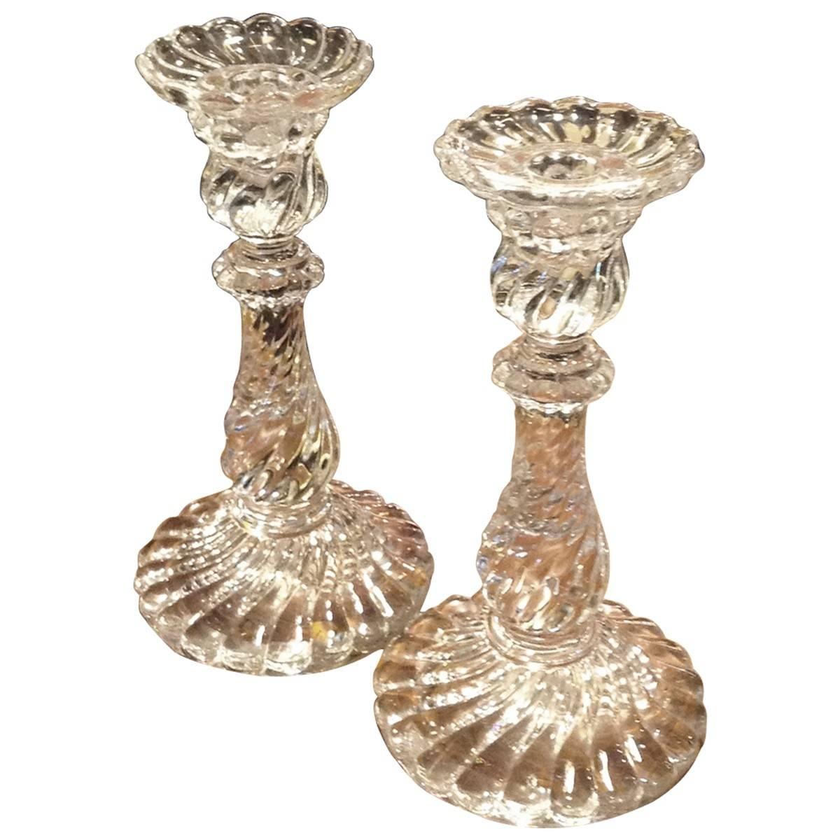 Baccarat has been an international leader in fine crystal design since its founding in France in 1764 that continues to develop unique designs which set the global standard for excellence in the field. Sleek and sculptural, this eye-catching pair of