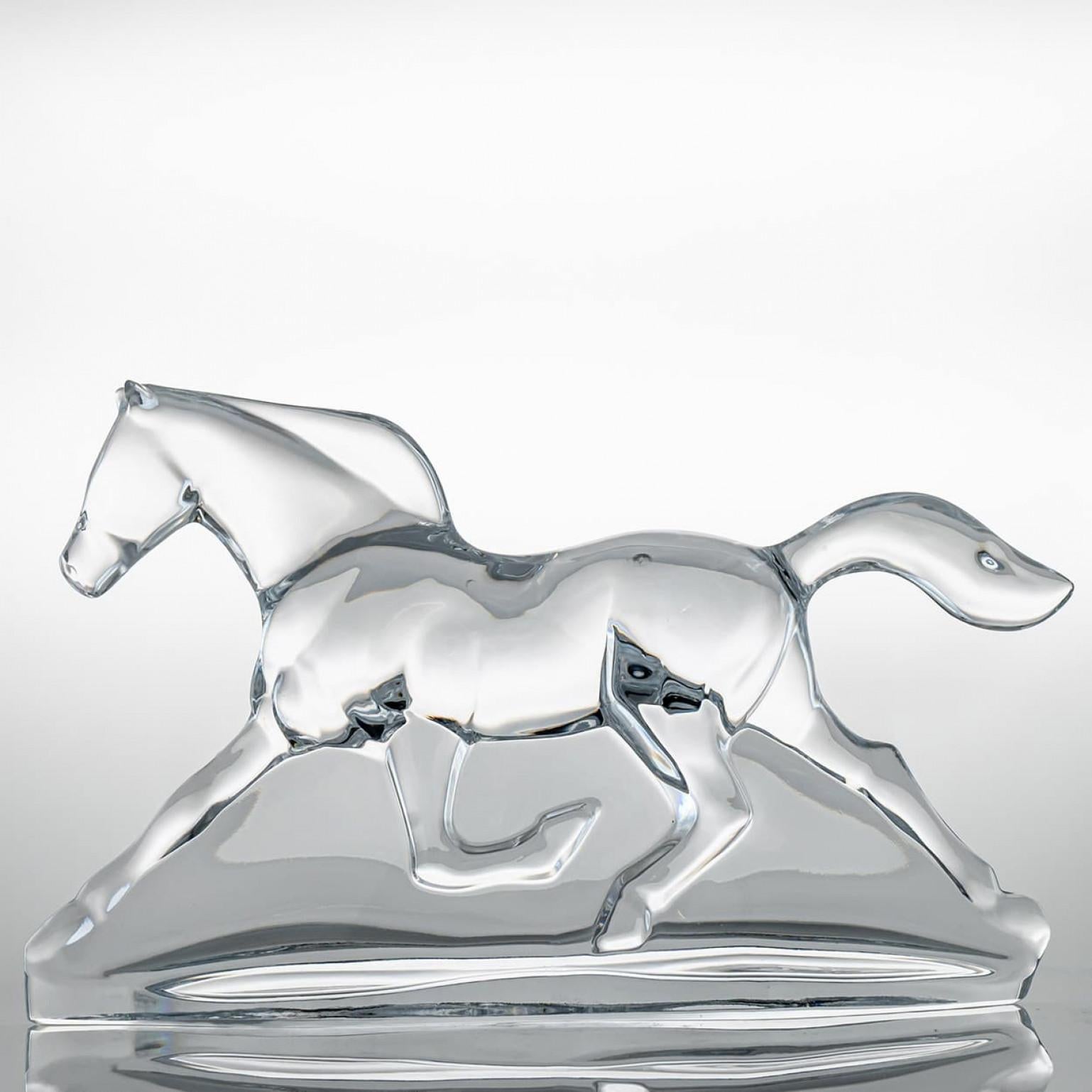 Luxury at its finest, high-end glass sculpture by Baccarat, France.

The sculpture is a horse called 