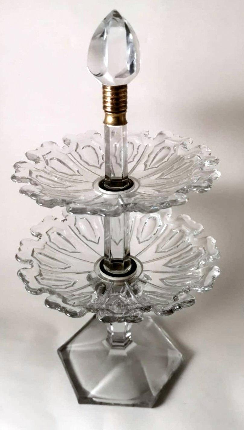 We kindly suggest that you read the entire description, as we try to give you detailed technical and historical information to guarantee the authenticity of our objects.
Rare and exceptional French crystal centerpiece; from the massive hexagonal