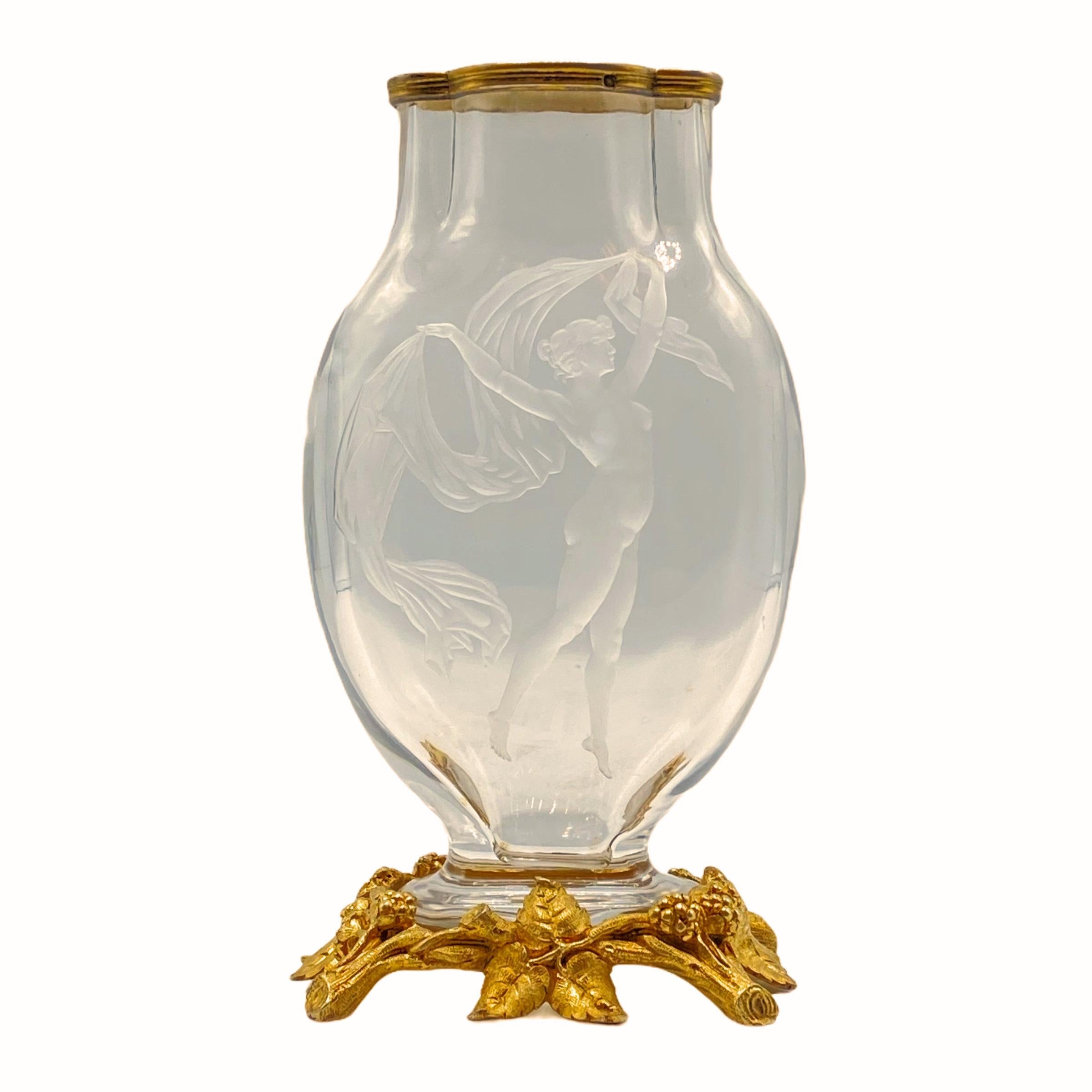 Very fine and rare 19 century French Baccarat attributed engraved crystal vase with with gilded silver mounts.


    