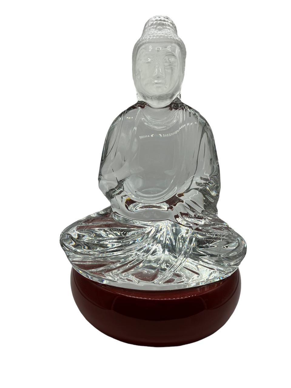 Baccarat clear crystal Buddah figurine designed by Kenzo Takada. This is a limited edition of 50. The statue is signed and numbered as 44. It comes with its original and limited-edition red cinnabar lacquered wood base.
 