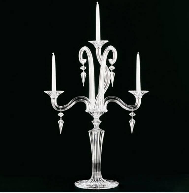 Elegant and sophisticated, the Mille Nuits collection offers fluid lines and intricated details. The three-light Baccarat candelabra is handcrafted in full-lead crystal that capture the light.
We're authorized Baccarat dealers in Brescia, (Italy)
