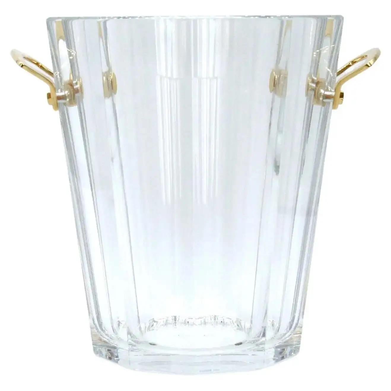 Beautifully hand crafted baccarat crystal barware / tableware champagne bucket or wine cooler with gilt bronze side handles. The cooler is in excellent condition. Maker's mark etched underneath. Minor wear. The bucket / cooler stands about 10 inches