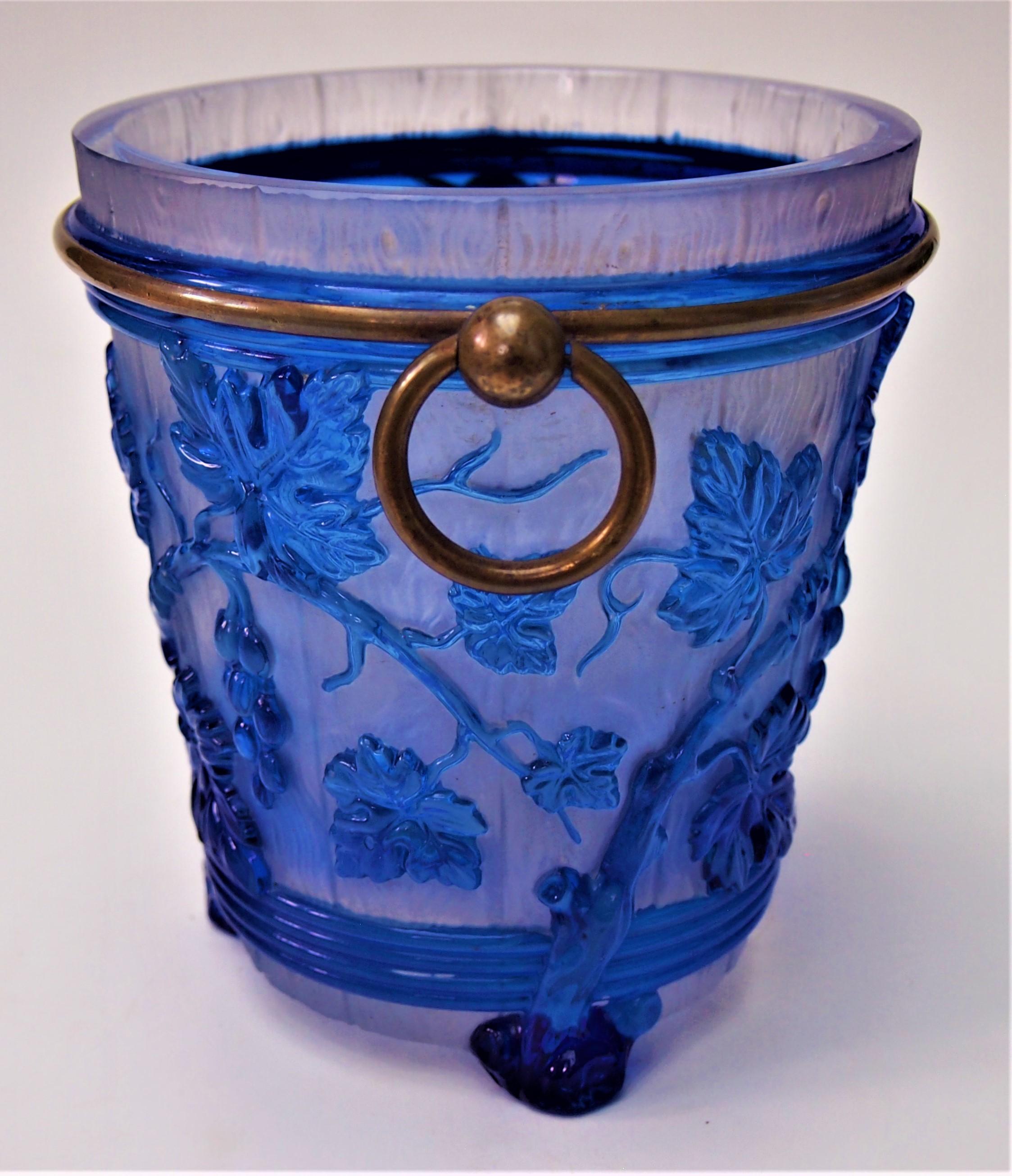 Fabulous Aesthetic Movement Baccarat Champagne Bucket  -ideal for a single bottle. Made c 1860 in pressed glass in blue crystal over (faux wood) clear crystal. Decorated with grape vines -banded with a hollow metal ring and circular handles (hollow
