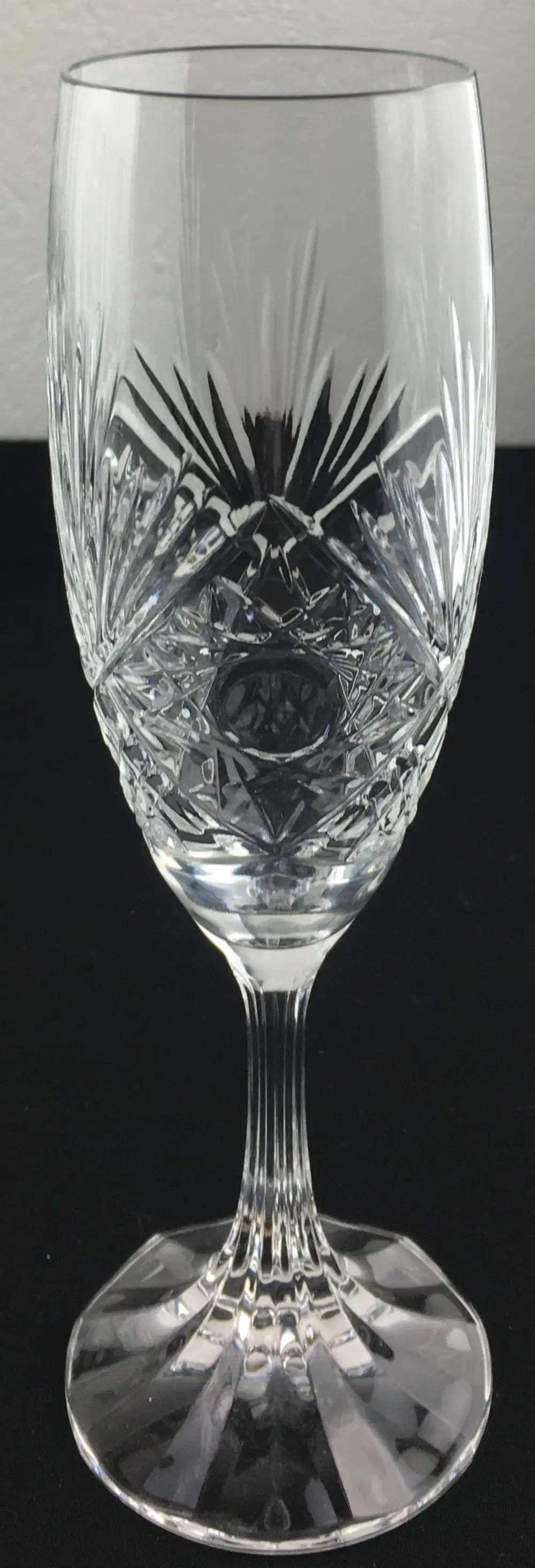 A truly elegant and fine quality Baccarat crystal champagne flutes, set of 8 still available. Beautiful details that will enhance any table and delight your guests. Designed by Valery Klein.

Each glass bears the Baccarat etched mark and references