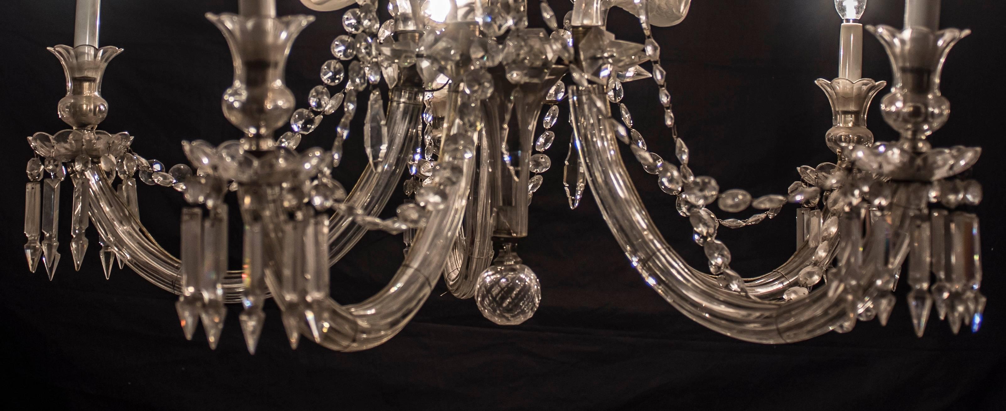 One of a kind chandelier in Baccarat crystal, with mythological faucets, in a very good condition, from a exceptional French collection.