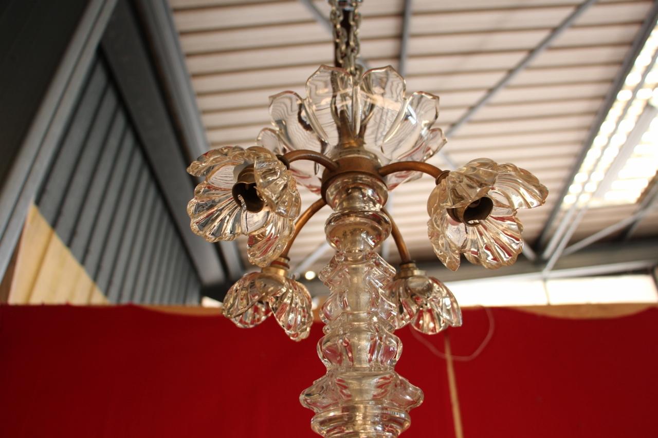 Baccarat chandelier from the early 20th century from the Baccarat crystal factory. This chandelier has 10 sconces. It is complete and in very good condition with its specific prisms and binets in very good condition 100% baccarat not electrified.