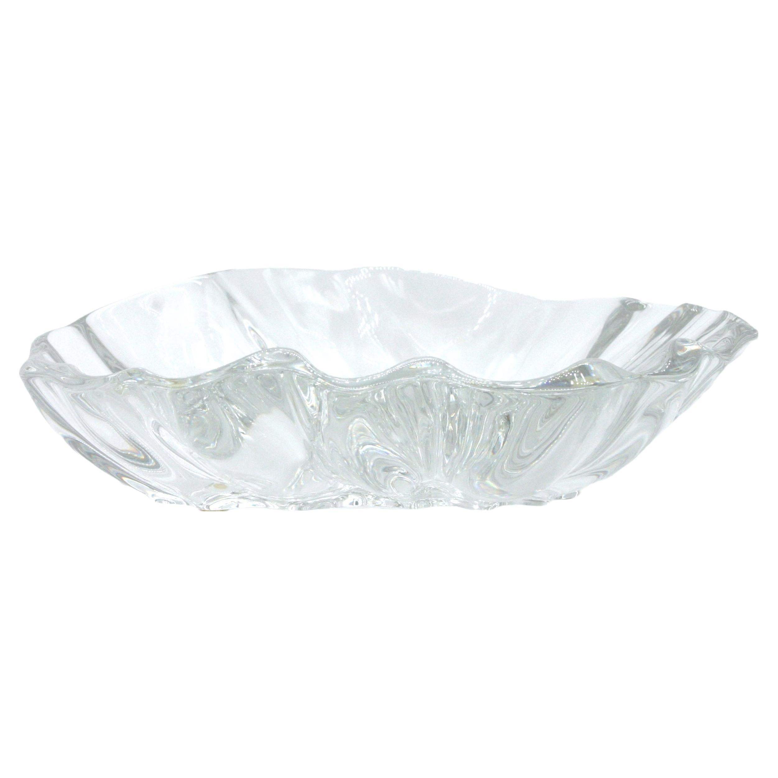 Beautifully hand crafted baccarat crystal decorative centerpiece bowl. The piece is in excellent condition. Maker's mark etched underneath. Minor shelves wear. The centerpiece measures 9.75 inches X 9.25 inches X 3.25 inches.
