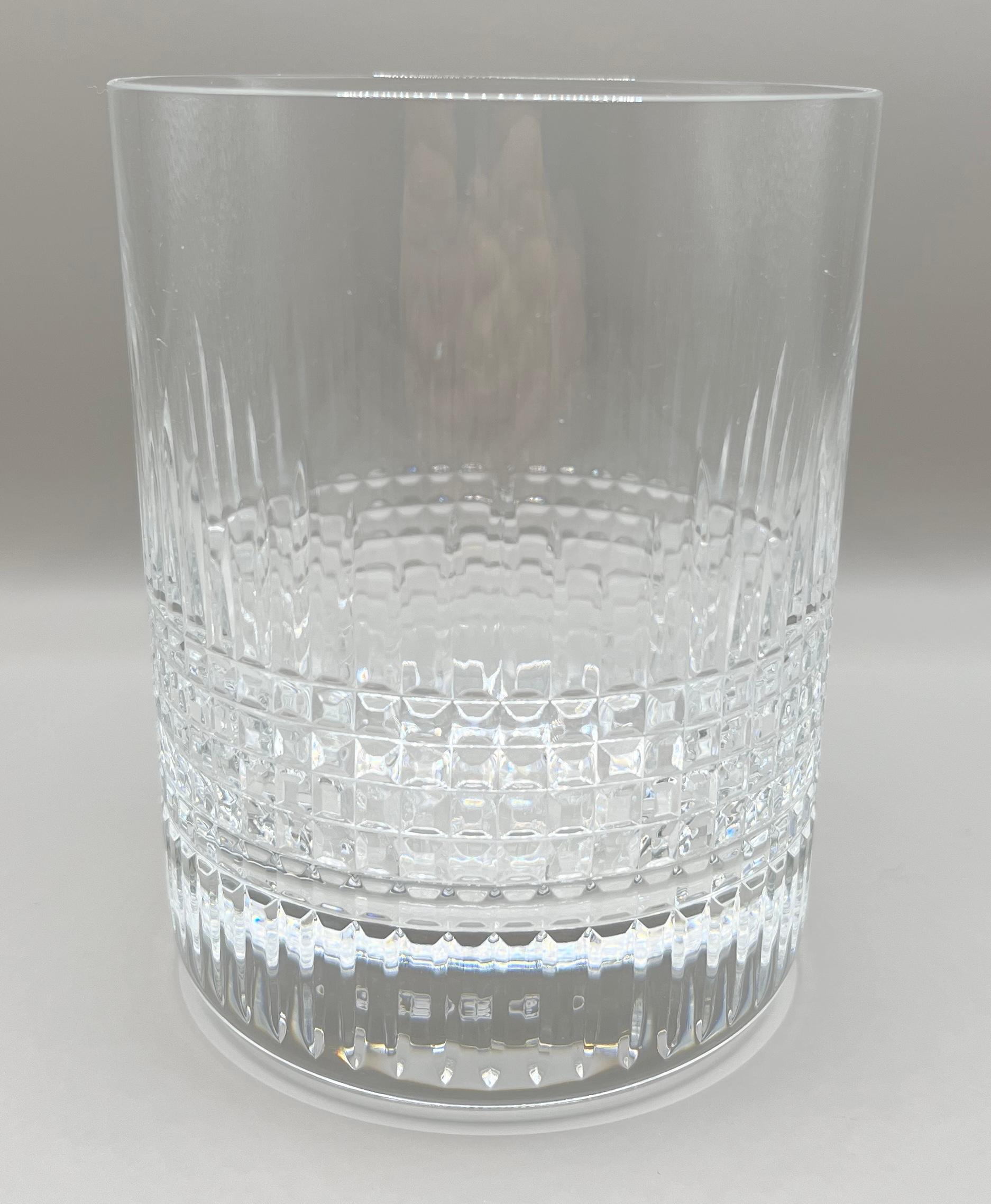 Baccarat crystal ice bucket, famous Nancy pattern created in 1908 listed in 1916 tableware catalog : a sought after model with a pure line and a timeless cut.
Our piece is signed under the base.
In excellent condition, almost as good as new. Crystal