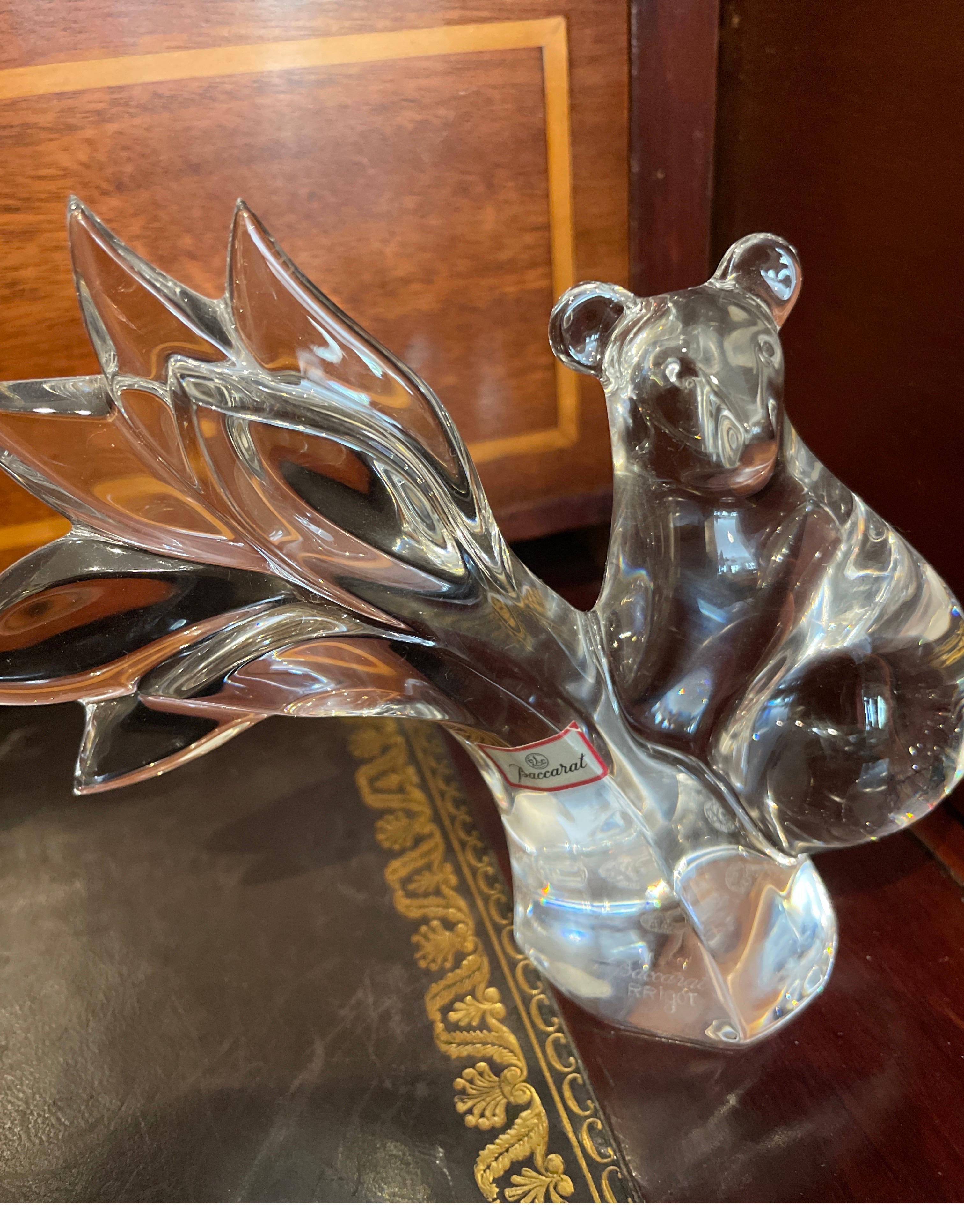 Baccarat crystal Koala bear in a tree figurine.