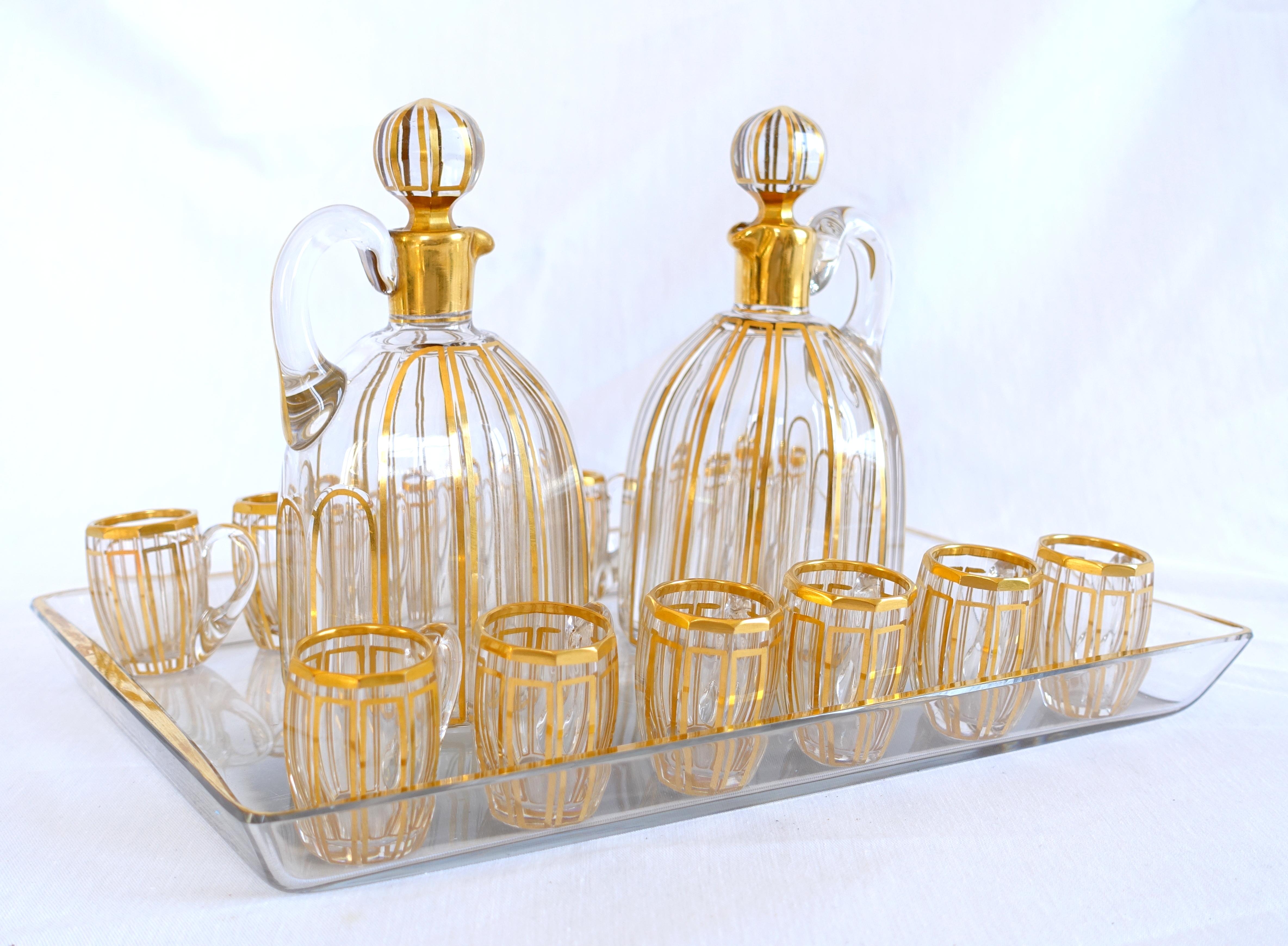 Louis XVI Baccarat crystal liquor set for 12, Cannelures cut pattern enhanced with gold