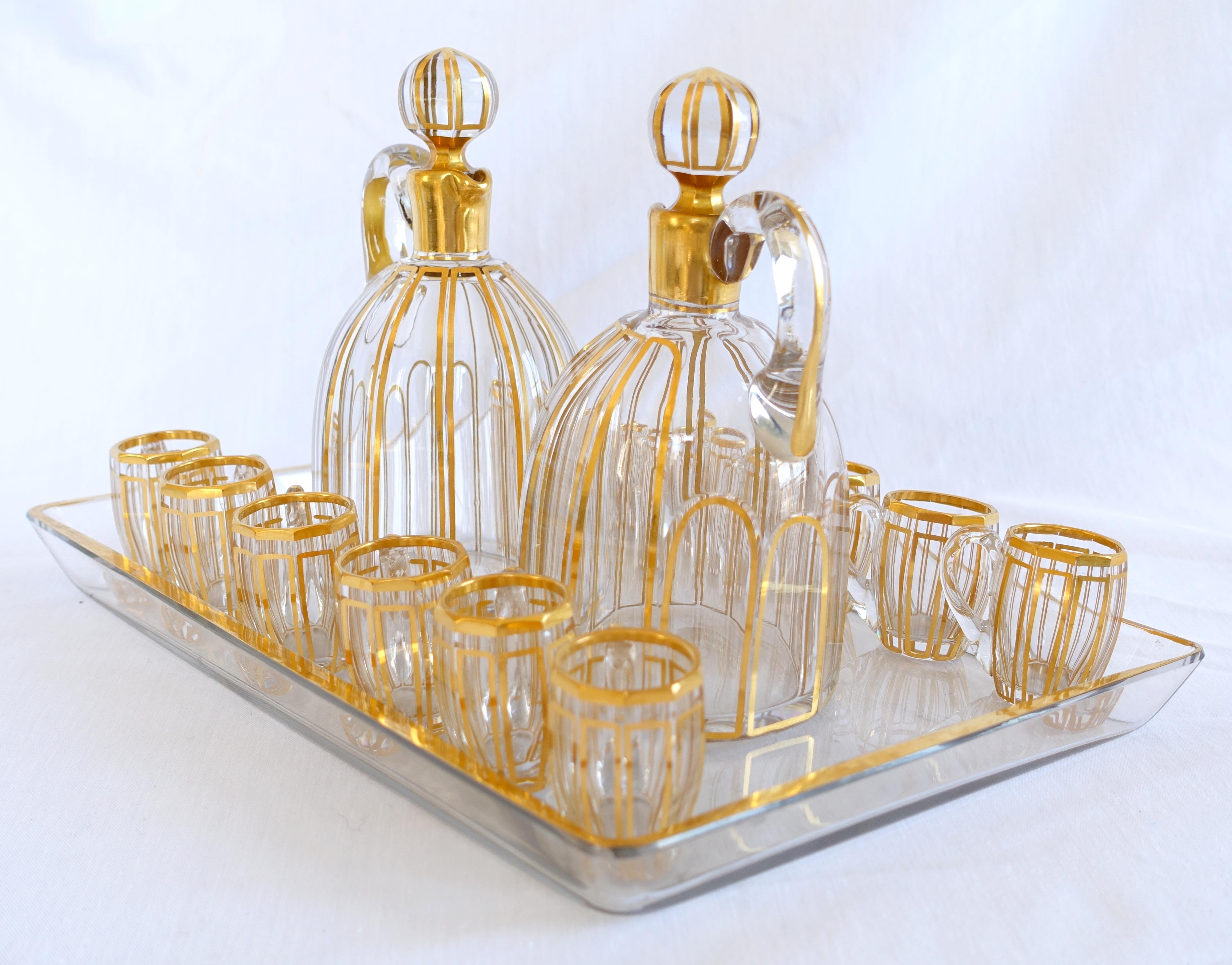 French Baccarat crystal liquor set for 12, Cannelures cut pattern enhanced with gold