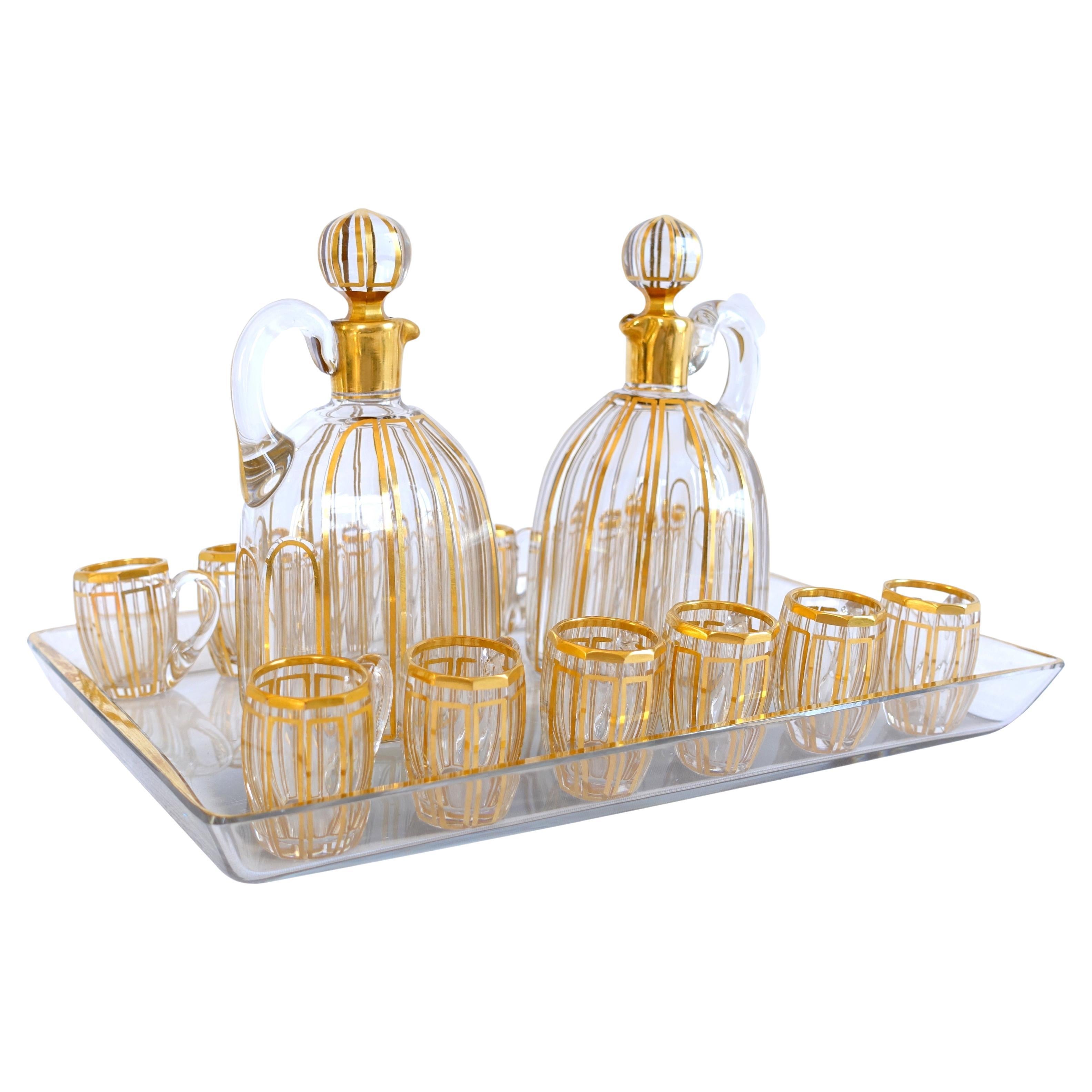 Baccarat crystal liquor set for 12, Cannelures cut pattern enhanced with gold