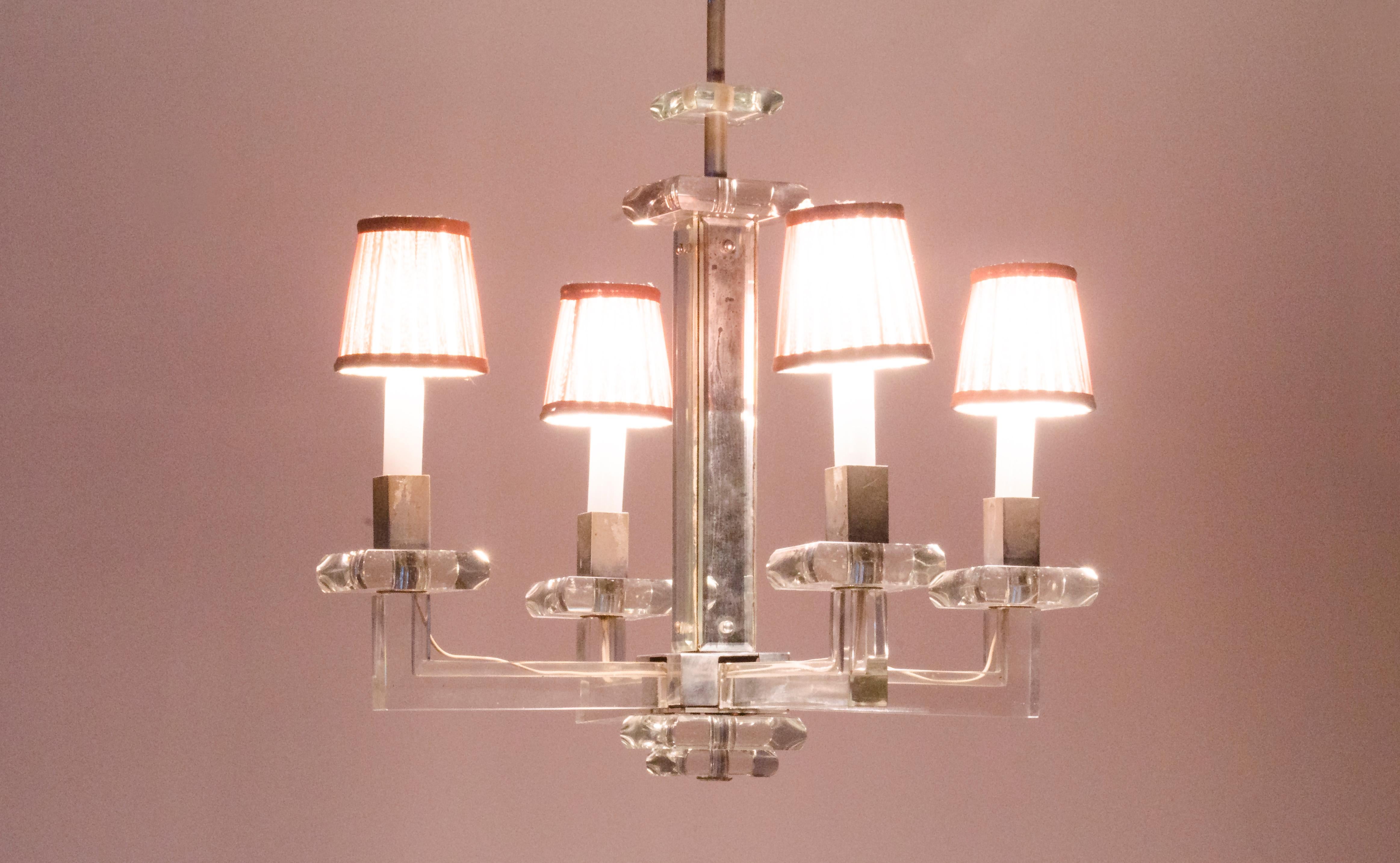 Pendant made with chromed bronze structure and Baccarat crystal. Attributed to Jacques Adnet (1900-1984).

France, CIRCA 1930.