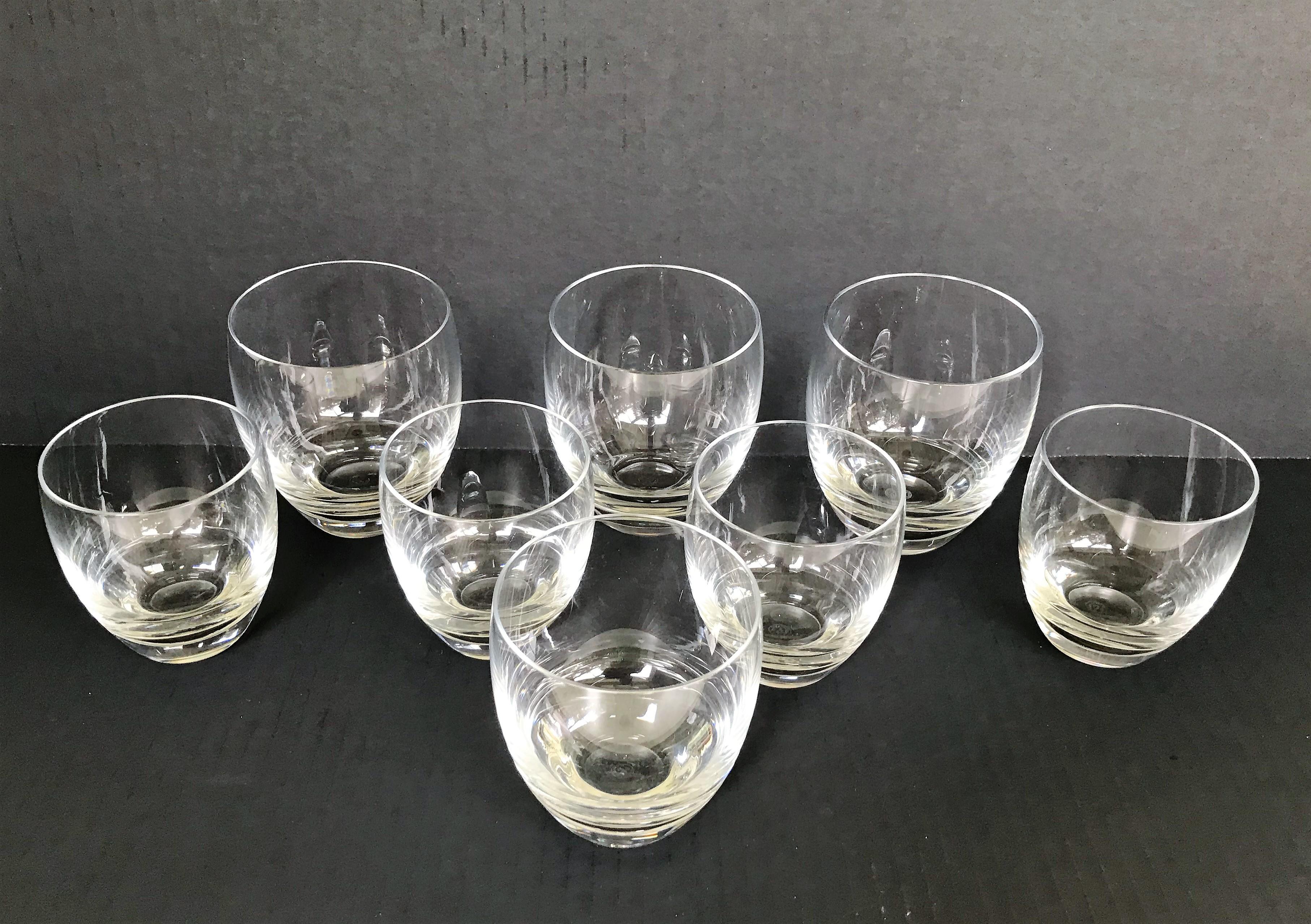 From the 1970s, Baccarat crystal glassware in the Perfection pattern...8 barrel shaped Tumblers of different sizes : Three (one w. small flake) 15 oz. - 4 inches high, One 10 oz. 3 5/8 inches high and Four 8 oz. 3 1/2 inches high. Lovely simple
