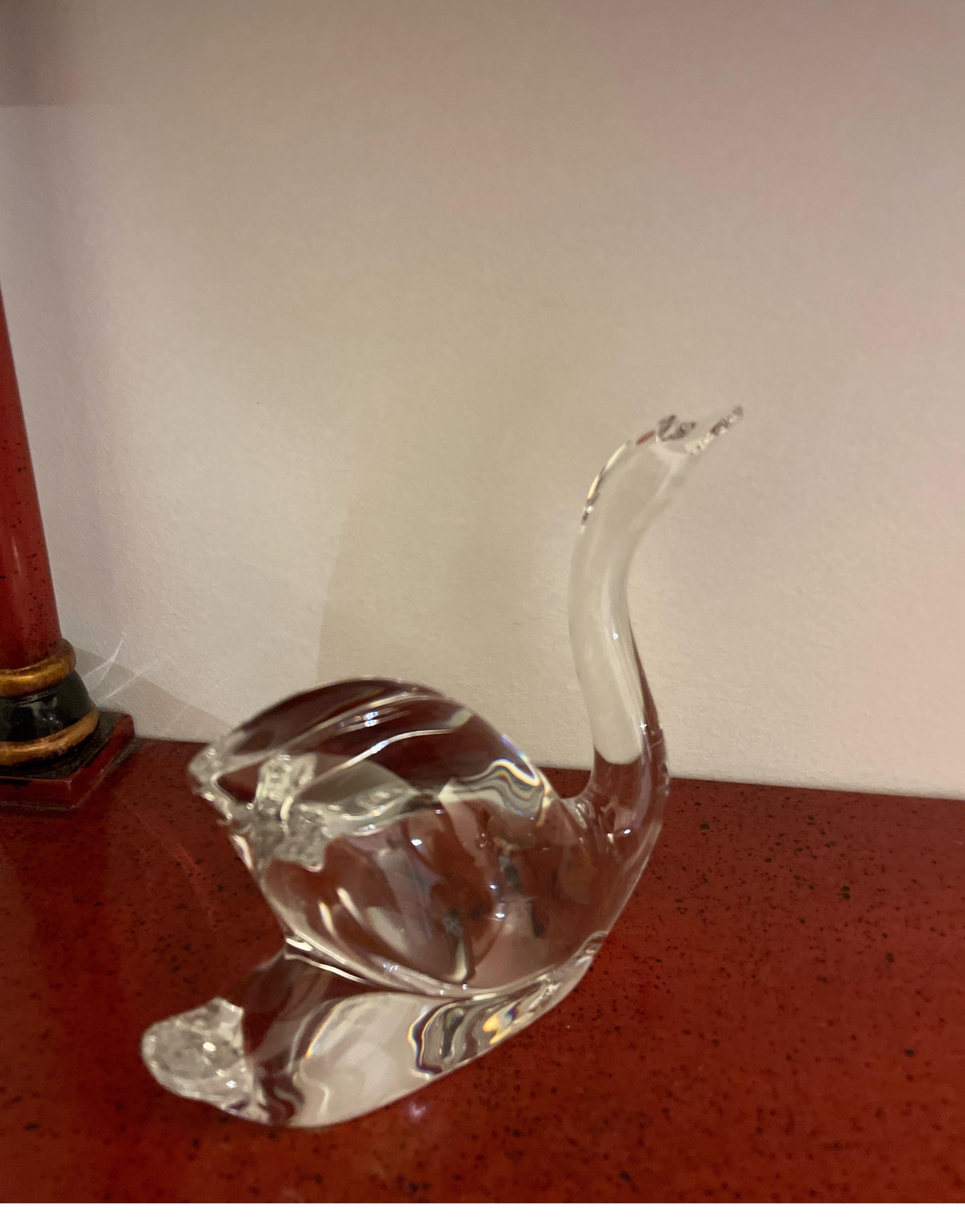 Baccarat crystal swan figurine with head up. A lovely addition to any collection. A perfect little paperweight.