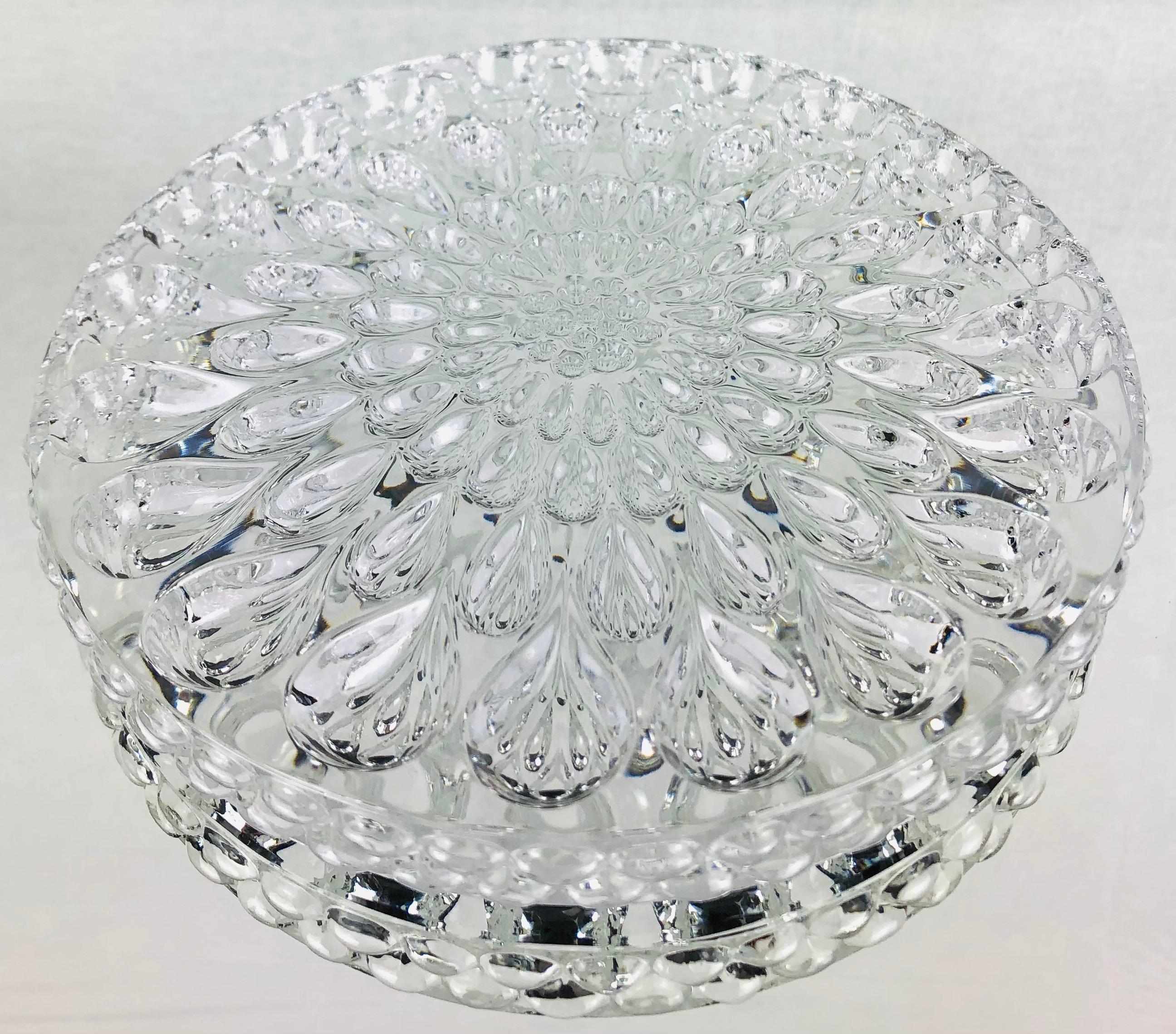 Beautiful pair of Baccarat crystal wine bottle coasters in their original box. 
Perfect condition. 

These Baccarat crystal Goutte D’eau/water drop model bottle or carafe coasters are ideal for protecting your marble countertops, tablecloth, wooden