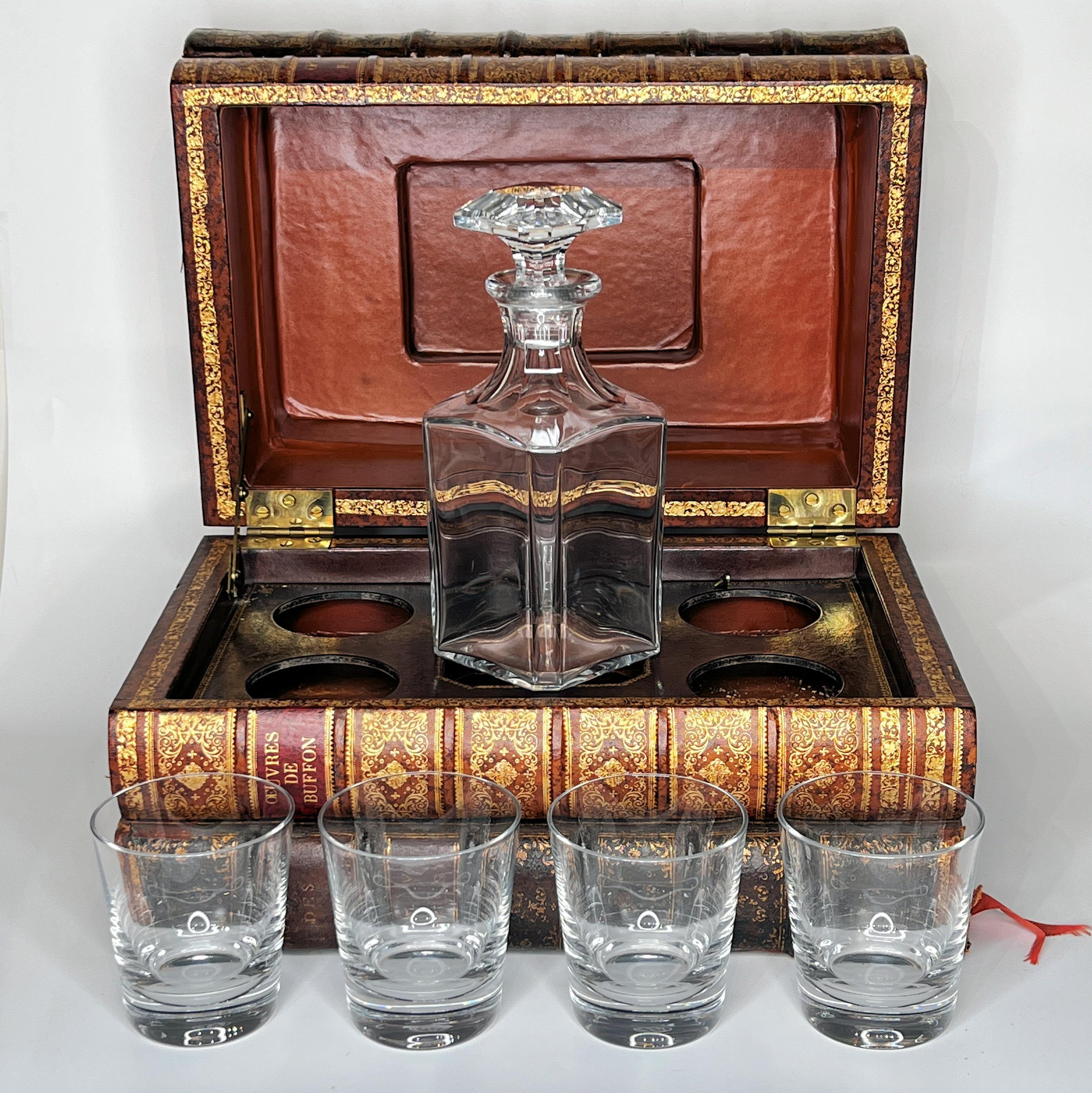 Very fine quality Baccarat decanter and highball glass set in antique style book form box.