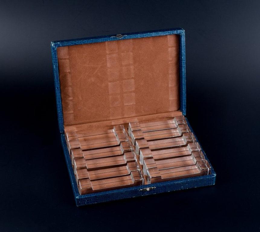 20th Century Baccarat, France. A complete set of twelve knife rests in original gift box. For Sale