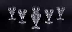 Baccarat, France. A set of six Art Deco glasses in clear crystal. Faceted.