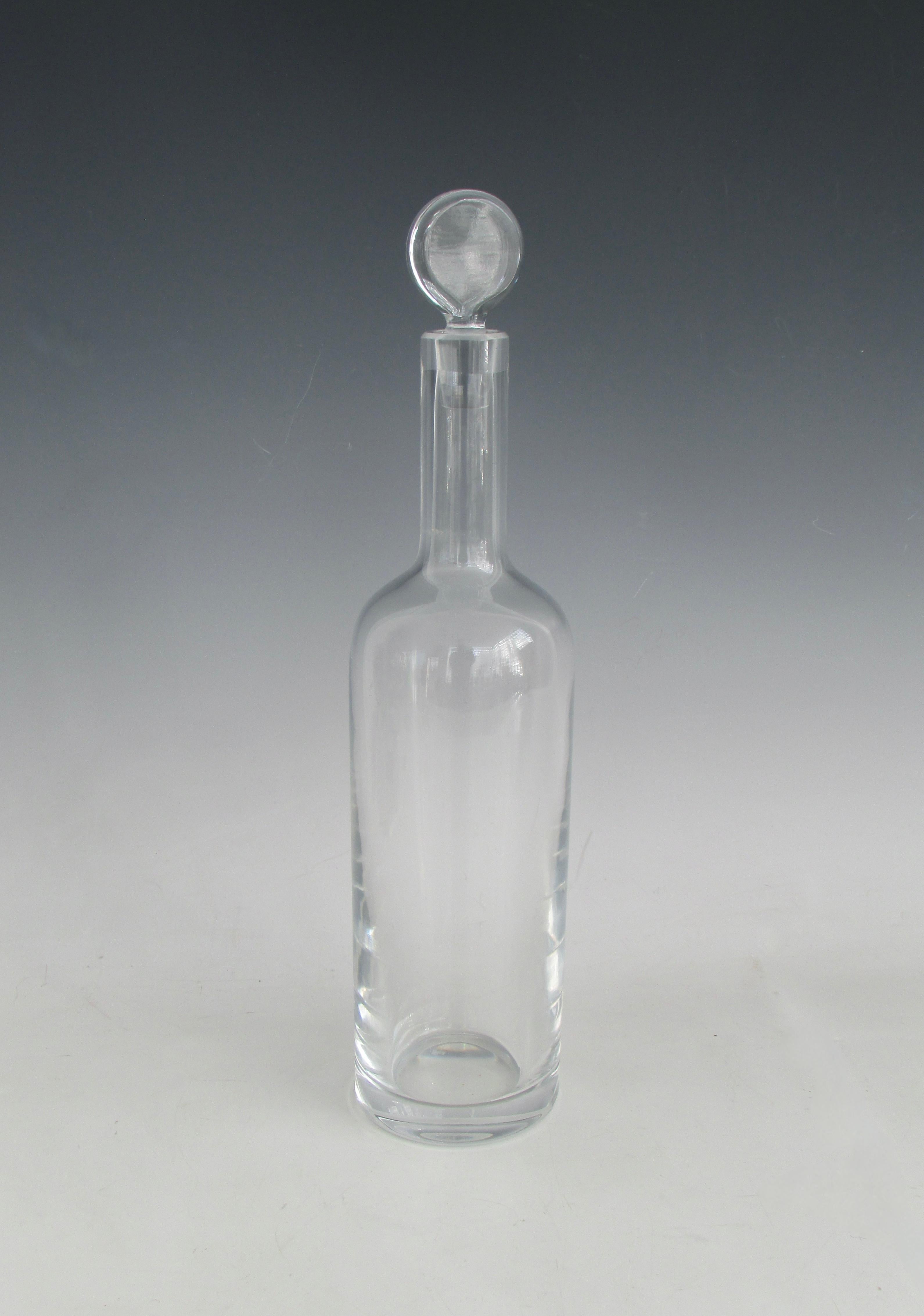 Elegant and simple lead crystal clear glass decanter. Produced by and acid etched Baccarat France. Fine condition.