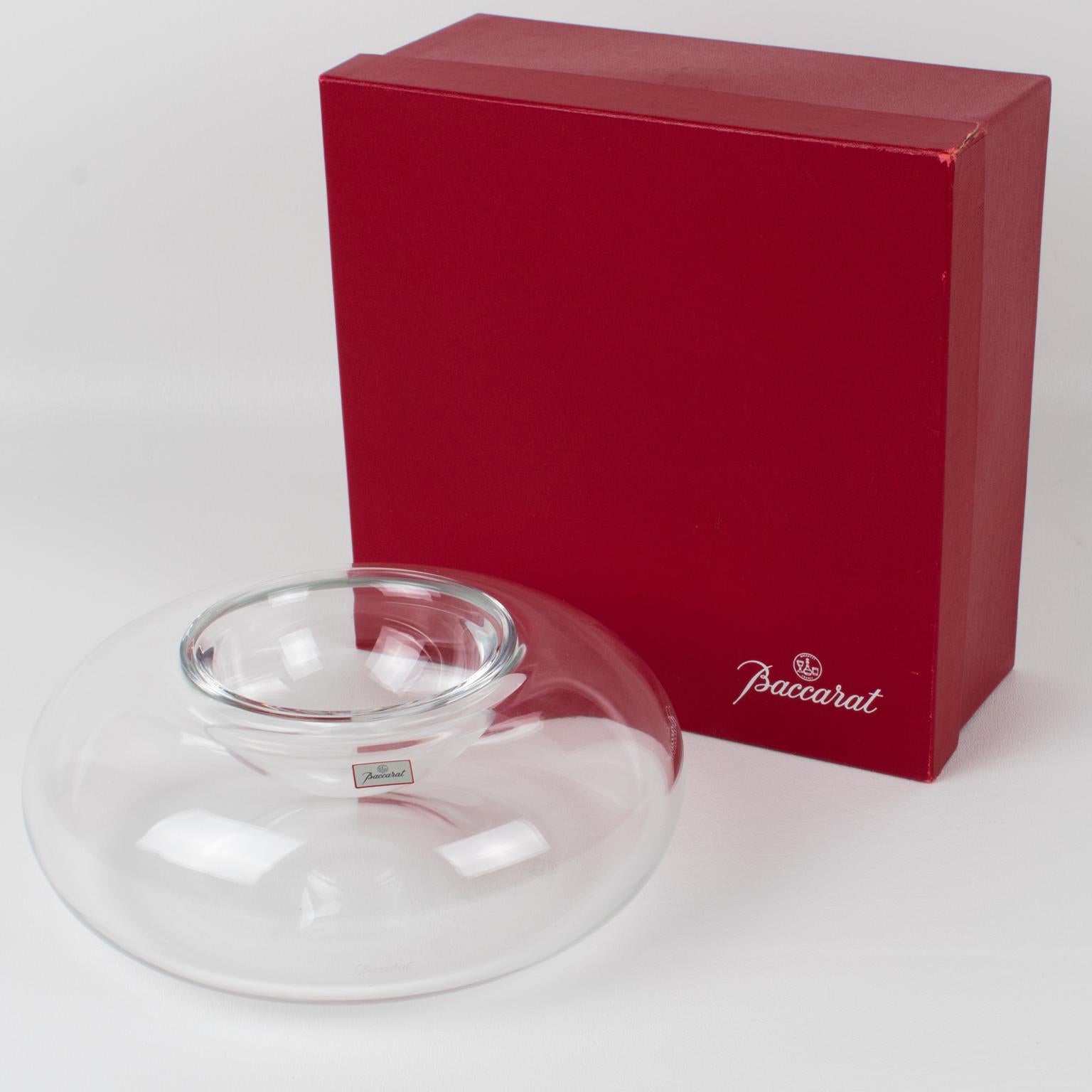 This is a luxury crystal caviar serving bowl, dish, or chiller designed by Baccarat at the turn of the 21st Century. The chic and minimalist design named 