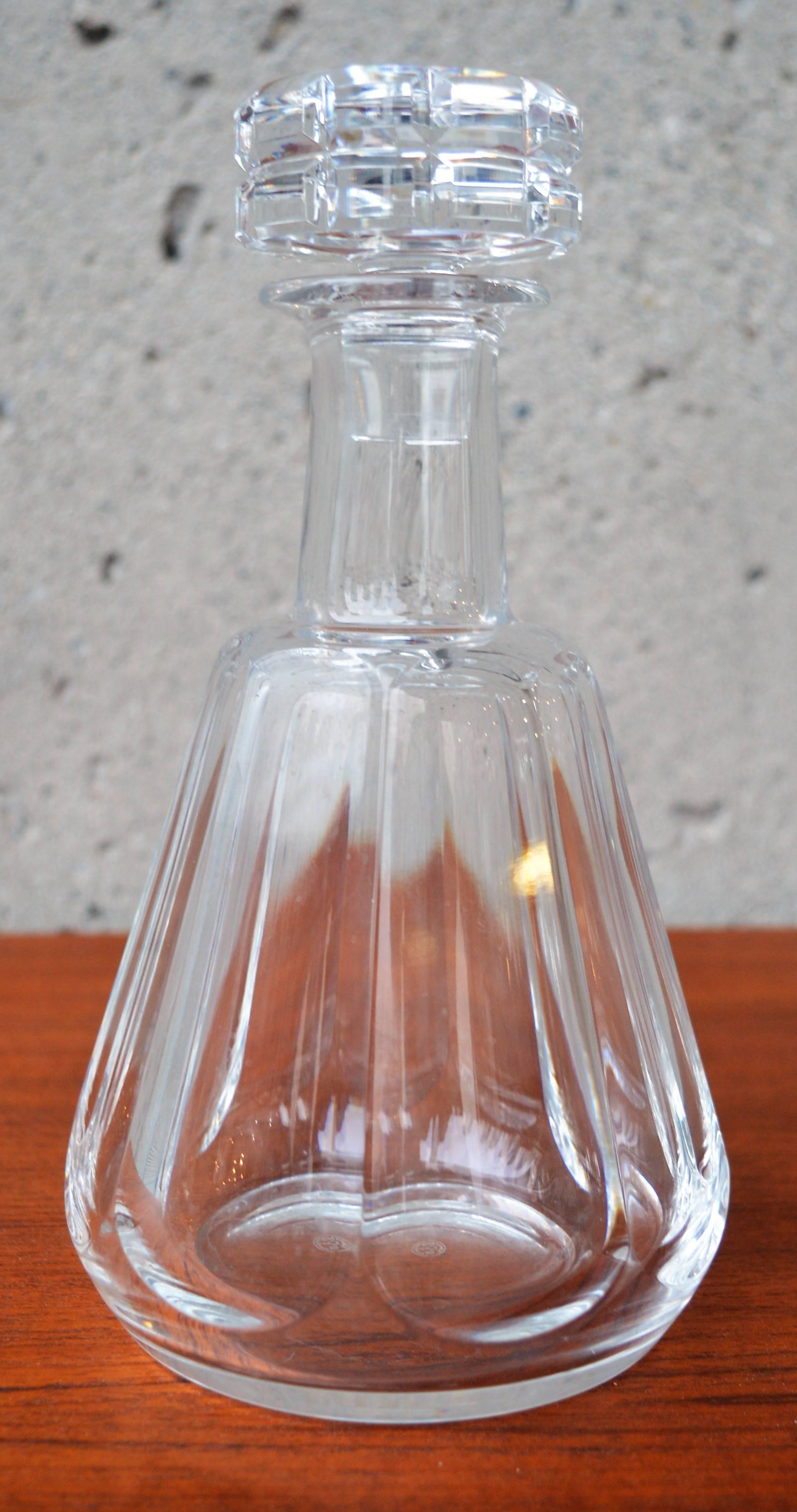 This exquisite French cut crystal decanter is beautifully faceted and in amazing condition, with no chips, breaks or repairs. Makers mark underneath. Small line of calcium on the bottom of the bottle which isn't visible unless turned upside down
