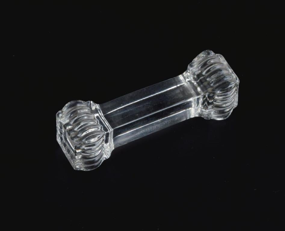 Baccarat, France, a set of five Art Deco knife rests in crystal glass.
1930s-1940s.
In perfect condition.
Dimensions: L 7,5 x D 4,0 cm.