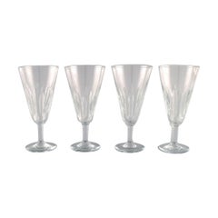 Baccarat, Frankreich, Vier Art-Déco-Champagnerflöten aus klarem Kristallglas