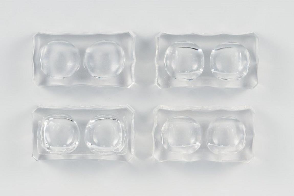 Baccarat, France. Four Art Deco double salt cellars, faceted crystal glass.
1930s/40s.
Measures: L 7.5 cm. x W 4.0 cm. x H 1.7 cm.
In good condition. Two salt jars with a few minimal and insignificant chips.