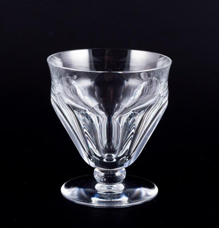 Mid-20th Century Baccarat, France. Set of four Art Deco white wine glasses in crystal glass. For Sale