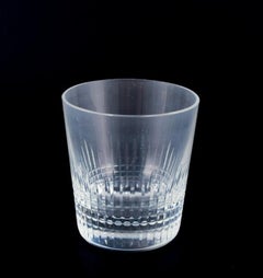 Baccarat, France. Set of four "Nancy" whiskey glasses in clear crystal glass.