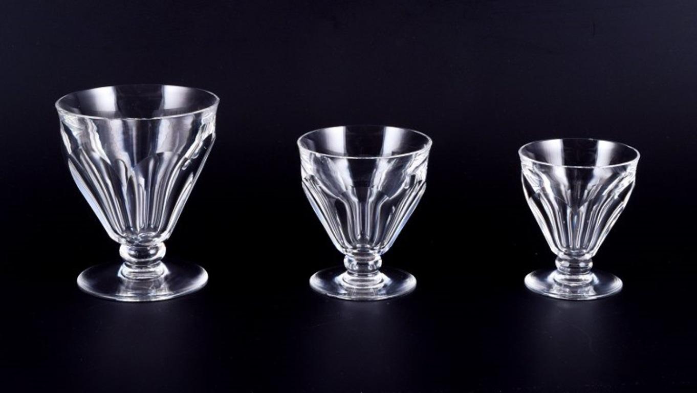 Baccarat, France. A set of six Art Deco glasses in faceted crystal glass. 
Different sizes.
From the 1930s/1940s.
Marked.
In good condition. All with one to two chips in the base and/or top.
Red wine: D 10.3 cm x H 7.8 cm.
White wine: D 7.6 cm x H