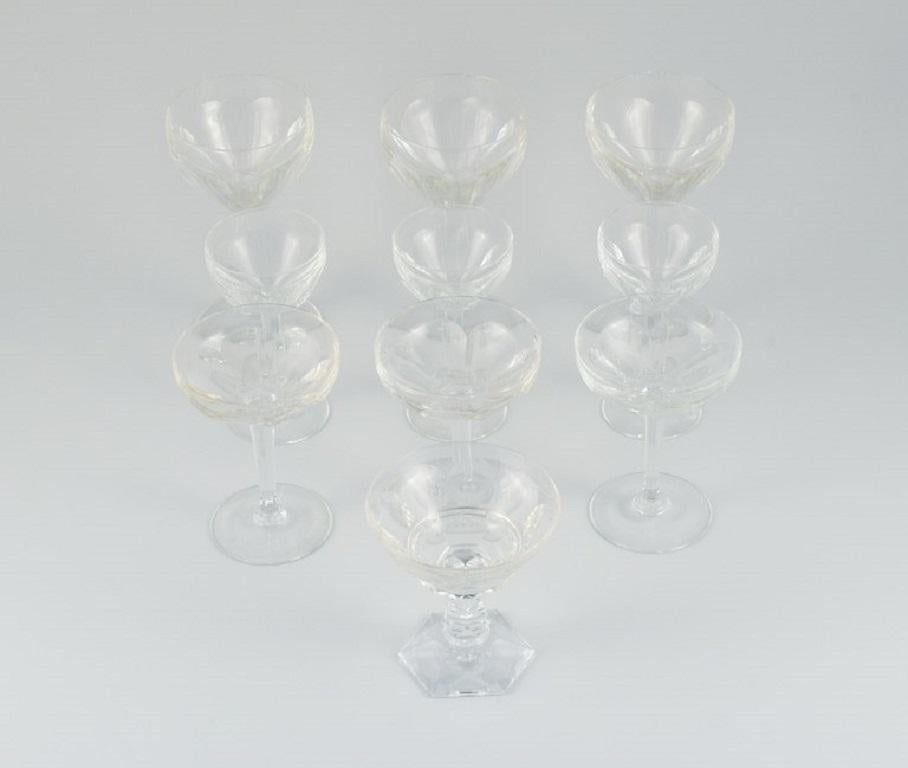 Baccarat, France. Ten Art Deco crystal glasses in clear glass, consisting of 3 red wine glasses, 4 champagne glasses and 3 white wine glasses.
All glass with chips.
Unstamped.
Red wine: H 18.0 cm.
Champagne: H 13.5 cm.
White: H 14 cm.