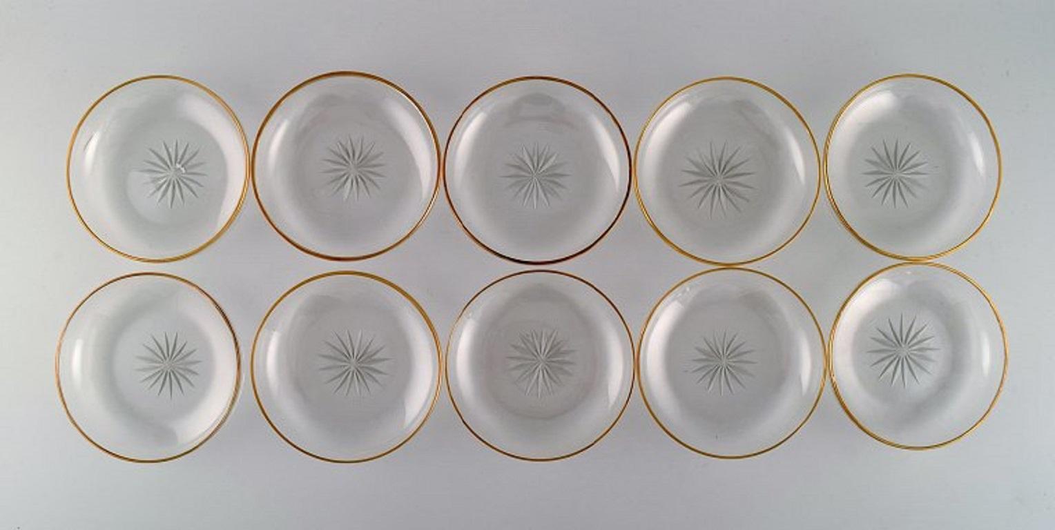 Baccarat, France. Ten Art Deco seafood bowls/rinse bowls in mouth-blown crystal glass with gold decoration. 1930s.
Measures: 11.8 x 3 cm.
In excellent condition.